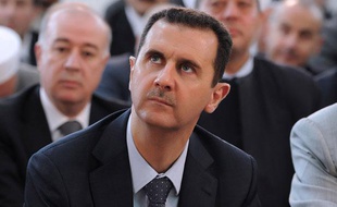 Le président syrien Bachar al-Assad lors d'une apparition publique à l'occasion de l'Aïd, le 19 août 2012, à Damas (Syrie).