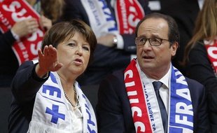 Martine Aubry et François Hollande, dans les tribunes du stade Pierre Mauroy le 22 novembre 2014, lors du double de la finale de Coupe Davis opposant la France à la Suisse.