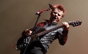 Le groupe anglais Muse lors d'un concert en Floride en 2013.