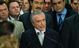 Le nouveau président brésilien par intérim Michel Temer lors de sa prise de fonction au palais du Planalto à Brasilia, le 12 mai 2016