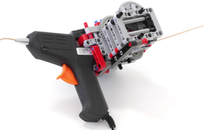 Un pistolet pour imprimer en 3D et fait en Lego.