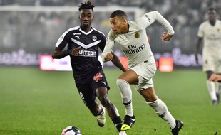 Kylian Mbappé au duel avec Yann Karamoh.