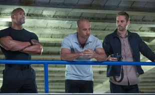 Dwayne Johnson, Vin Diesel et Paul Walker dans Fast & Furious 6.