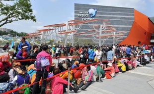 Des dizaines de milliers de visiteurs se pressaient samedi pour l'ouverture de l'Exposition internationale 2012 à Yeosu, en Corée du Sud, consacrée à l'avenir des éco-systèmes marins
