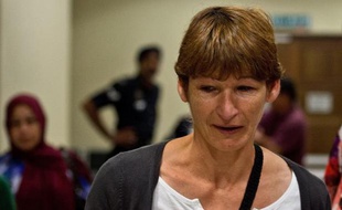 Irène Mortel, la mère de Stéphanie Foray, à l'annonce du verdict, à Kuantan, le 9 juillet 2014