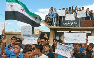 Protestation contre le régime syrien à Hula, près de Homs, le 24 octobre.