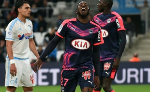 Poko, le milieu de terrain des Girondins lors d'un match joué à Marseille, le 10 avril 2016. AFP PHOTO / ANNE-CHRISTINE POUJOULAT