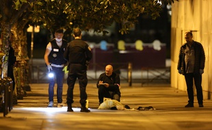 Les policiers sur le lieu de l'agression dans le XIXe arrondissement de Paris, le 9 septembre 2018.