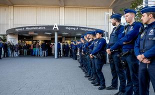 Mandatory Credit: Photo by Shutterstock (13620772d)  Illustration shows  a guard of honnor for the police officer injured in a stabbing attack last Thursday, as he is leaving hospital, UZ Jette, Saturday 12 November 2022.  Brussels Police Officer Injured, Brussels, Belgium - 12 Nov 2022/shutterstock_editorial_Brussels_Police_Officer_Injure_13620772d//2211121606