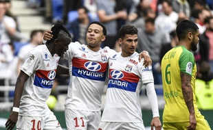 Bertrand Traoré, Memphis Depay et Houssem Aouar savourent le net succès lyonnais samedi dernier contre Nantes (2-0). JEFF PACHOUD