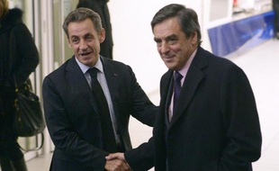 Nicolas Sarkozy et François Fillon au siège de l'UMP le 2 décembre 2014 à Paris
