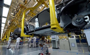 Une usine de production de voitures Volkswagen, à Chengdu, dans la province du Sichuan, au sud-ouest de la Chine, le 6 juillet 2014, lors d'une visite de la chancelière allemande Angela Merkel