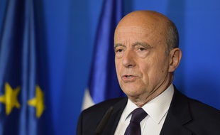 Alain Juppé ne veut pas "redescendre dans l'arène". / AFP PHOTO / Nicolas TUCAT