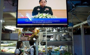 Le chef de l'armée thaïlandaise, le général Prayut Chan-O-Cha, prononce un discours à la télévision, à Bangkok, le 30 mai 2014