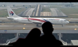 Un avion de la Malaysia Airlines sur le tarmac de l'aéroport le 27 juillet 2014 à Kuala Lumpur