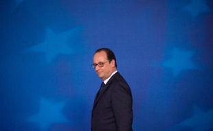 Le président François Hollande s'apprête à donner une conférence de presse à l'issue d'un sommet extraordinaire à Bruxelles, le 16 juillet 2014