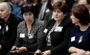 Des proches des victimes de la prise d'otage de Beslan, à l'audience de la Cour européenne des droits de l'Homme le 14 octobre 2014 à Strasbourg