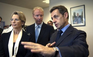 De gauche à droite, Michèle Alliot-Marie, Brice Hortefeux, et Nicolas Sarkozy, le 24 novembre 2009 à Epinay sur Marne