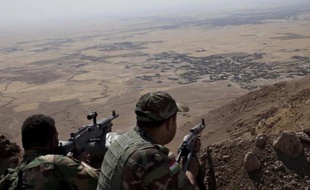 Des soldats peshmergas sur le Mont Zardak à environ 25 km de Mossoul en Irak, le 9 septembre 2014