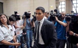 M'Hamed Bellouti (C) arrives at the Paris courthouse on June 25, 2008, for the trial in which he is sueing French President Nicolas Sarkozy's 21-year-old son Jean Sarkozy. Jean Sarkozy, a law student who this year made his political debut as local councillor in a wealthy Paris suburb, allegedly crashed his scooter into the rear of M'hamed Bellouti's BMW car in October 2005 before speeding off. AFP PHOTO MARTIN BUREAU
