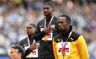 Le podium du 100m des Mondiaux de Londres, avec Justin Gatlin en or et Usain Bolt médaille de bronze.