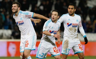 Mathieu Valbuena et Dimitri Payet avec André-Pierre Gignac lors du match contre Toulouse le 2 février 2014.