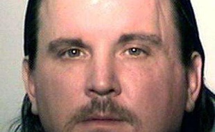 Photo non datée diffusée par la police de l'Indiana de Michael Plumadore, qui a avoué le meurtre et le démembrement de la fillette Aliahna Lemmon, le 26 décembre 2011.