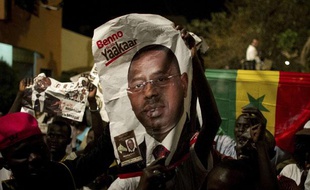 Des partisans de Macky Sall dans les rues de Dakar, au Sénégal, le 25 mars 2012.